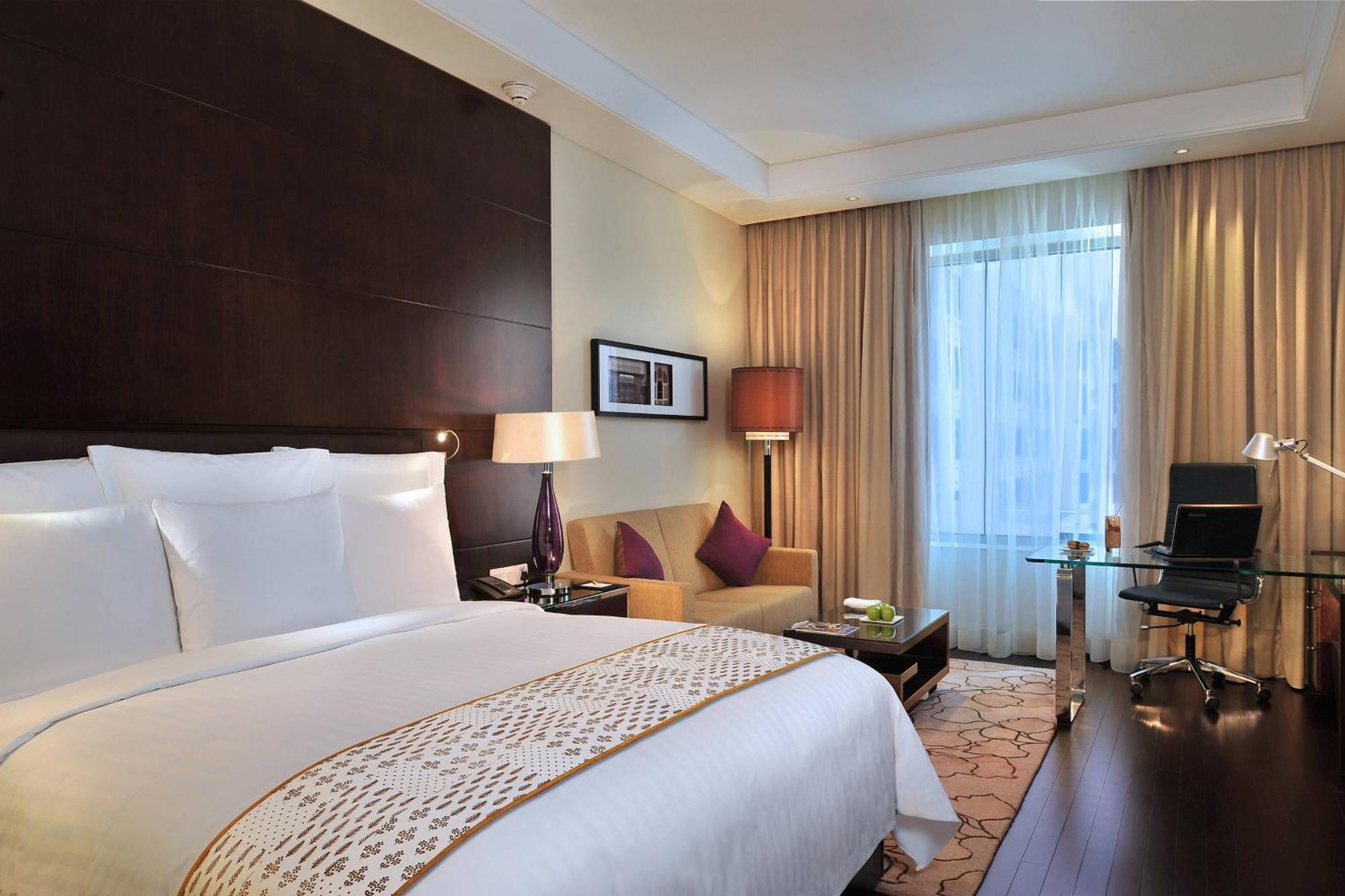 Jaipur Marriott Hotel Extérieur photo A room at the Taj Bengal