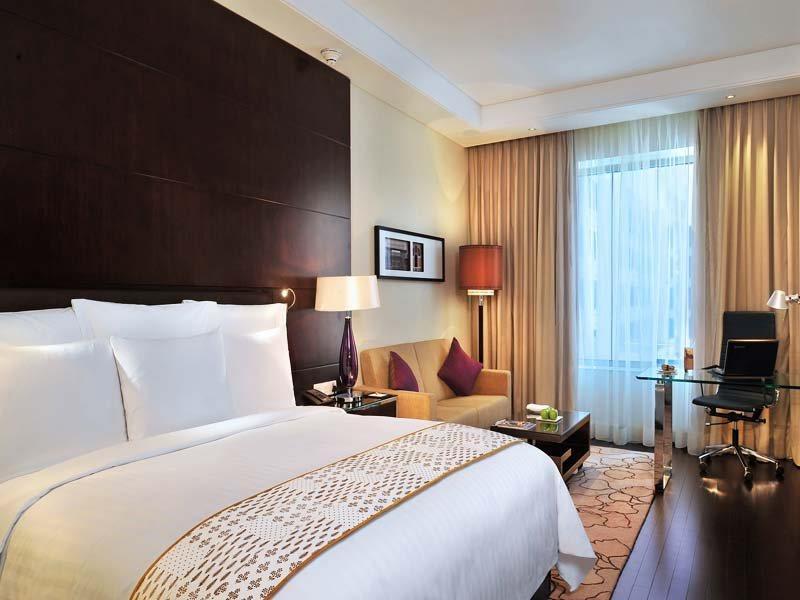 Jaipur Marriott Hotel Extérieur photo A room at the Taj Bengal