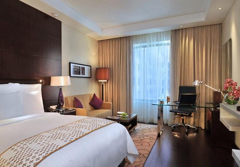 Jaipur Marriott Hotel Extérieur photo A room at the Taj Bengal